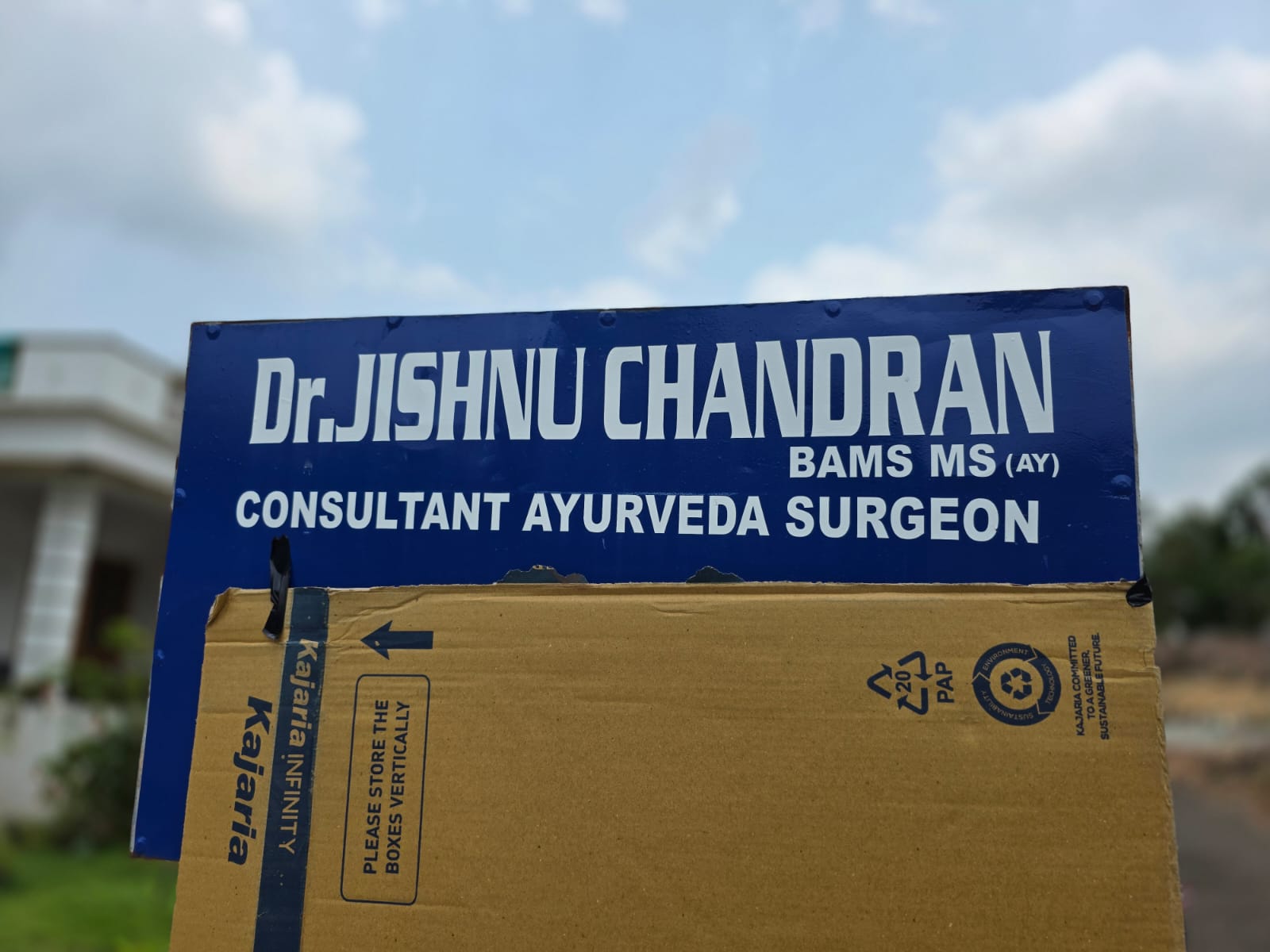 Dr. Jishnu Chandran clinic signboard, Kannur